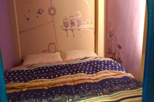 Postel nebo postele na pokoji v ubytování Star Moon Forest Inn