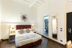 A bed or beds in a room at SuitInn19