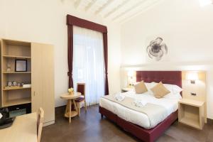 A bed or beds in a room at SuitInn19