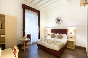 A bed or beds in a room at SuitInn19