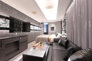 Voodi või voodid majutusasutuse Hotel Pasadena 食べ放題飲み放題 - Couple Hotel toas