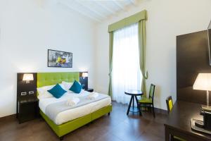 A bed or beds in a room at SuitInn19