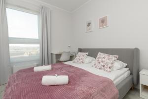 Posteľ alebo postele v izbe v ubytovaní Deluxe Apartments Sucha Gdańsk by Noclegi Renters