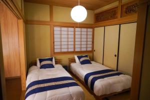 Katil atau katil-katil dalam bilik di Living CUBE Beppu