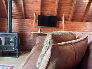 A television and/or entertainment centre at Harmanlı Bungalov
