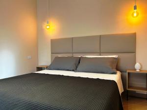 Postel nebo postele na pokoji v ubytování B&B Radice