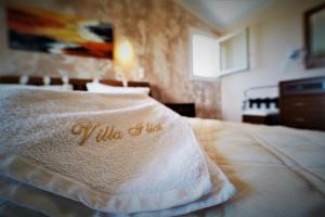 Postel nebo postele na pokoji v ubytování Villa Ilias
