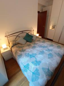 Postel nebo postele na pokoji v ubytování Profumo di pesto appartamenti Genova