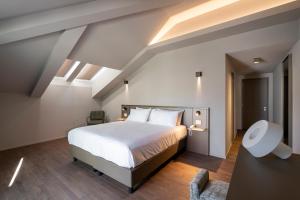 Postel nebo postele na pokoji v ubytování Hotel Promessi Sposi