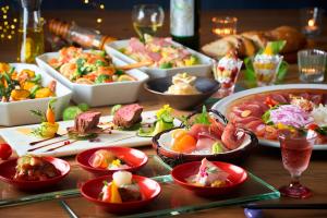 a table with many different dishes of food on it at TAOYA Akiu in Sendai