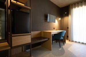 En TV eller et underholdningssystem på 6532 Smart Hotel - Self check-in