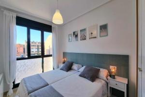 Postel nebo postele na pokoji v ubytování Apartamento El Picu Posada + 27 fotografií