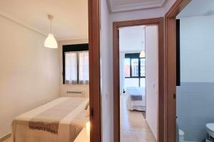 Postel nebo postele na pokoji v ubytování Apartamento El Picu Posada
