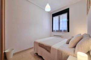 Postel nebo postele na pokoji v ubytování Apartamento El Picu Posada