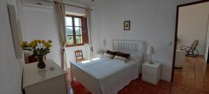 A bed or beds in a room at Casa Castellitx Mallorca Még 36 kép
