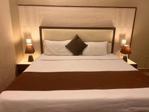 Кровать или кровати в номере Hotel SB Castle