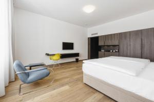 Postel nebo postele na pokoji v ubytování Theresian Hotel