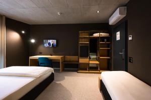 En eller flere senger på et rom på 6532 Smart Hotel - Self check-in