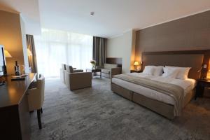 Łóżko lub łóżka w pokoju w obiekcie HAVET Hotel Resort & Spa