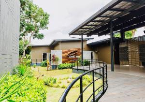 a building with a staircase in front of it at rastahostel by little boat in Chaweng