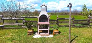 A garden outside Casavacanze Pergolino, appartamenti ad uso esclusivo