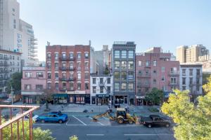 a view of a parking lot in a city at East Village 3br w wd nr Union Square NYC-994 in New York