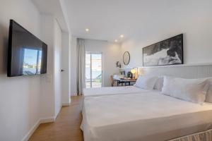 A bed or beds in a room at HM Dunas Blancas Még 37 kép