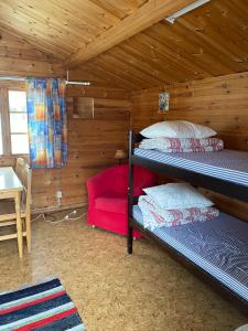 เตียงสองชั้นในห้องที่ Delsbo Camping