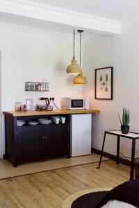 Η κουζίνα ή μικρή κουζίνα στο Figberry Guestrooms +39 φωτογραφίες