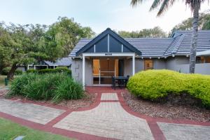 a house with a patio in front of it at Bayview Geographe Resort Busselton in Busselton