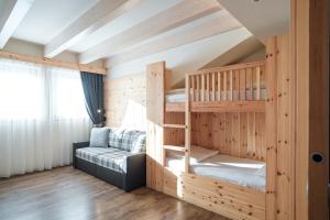 Postel nebo postele na pokoji v ubytování Hotel Piccola Baita