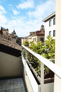 a view of a balcony of a building at [DUOMO] Elegant Penthouse in Parma