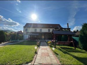Fotografie z fotogalerie ubytování Pensiunea Class v destinaci Sălişte