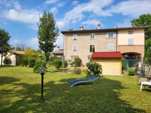 a house with a playground in the yard at Residence Antico Borgo in Modena +136 photos