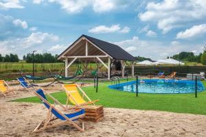 Πισίνα στο ή κοντά στο Apartament L13 z basenem, sauną, widokiem na Tatry - na terenie Sun and Snow