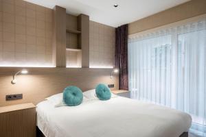 Posteľ alebo postele v izbe v ubytovaní C-Hotels Excelsior