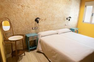 Postel nebo postele na pokoji v ubytování Hotel Un lugar en la Vecilla