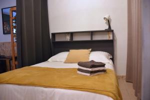 Posteľ alebo postele v izbe v ubytovaní Ô Toulouse - Appart cosy - Wifi
