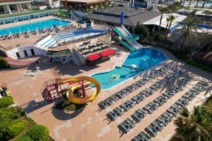 an aerial view of a pool with a water park at Clover Magic Seagate Belek in Antalya