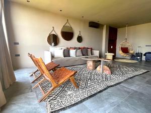 a living room with a couch and a table at Palais Souad in Marrakesh