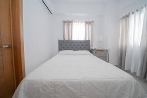 Postel nebo postele na pokoji v ubytování Beautiful 1br In Citycenter Wifi Ac