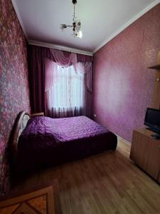 Llit o llits en una habitació de Zatyshok