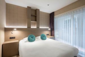 Posteľ alebo postele v izbe v ubytovaní C-Hotels Excelsior