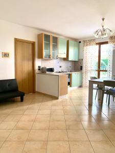 A kitchen or kitchenette at Casa Alice