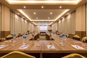 a large conference room with a long table with chairs at Hotel Sarathi in Dhulikhel