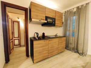 Kuchyň nebo kuchyňský kout v ubytování Antico Borgo Lago di Como