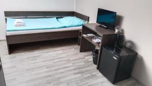 Postel nebo postele na pokoji v ubytování PENZION U BRÁZDŮ