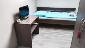 Postel nebo postele na pokoji v ubytování PENZION U BRÁZDŮ