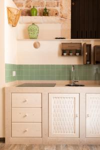 Η κουζίνα ή μικρή κουζίνα στο Camere Caroseno