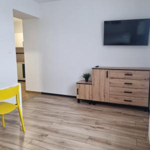TV a/nebo společenská místnost v ubytování Figaro Apartaments